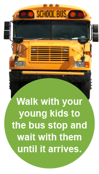 Walk with your kids to the bus stop and wait with them until it arrives.