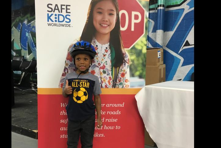 Little Boy give thumbs up at the GM Detroit Checkup Event