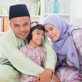 Malaysian family in home